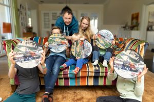 Johanna and Frederik Braun with their children and the limited edition vinyl record 